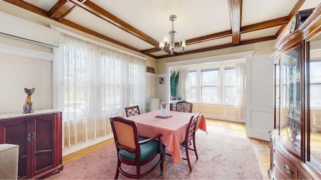 dining space with a chandelier, beamed ceiling, a wall mounted AC, coffered ceiling, and radiator heating unit