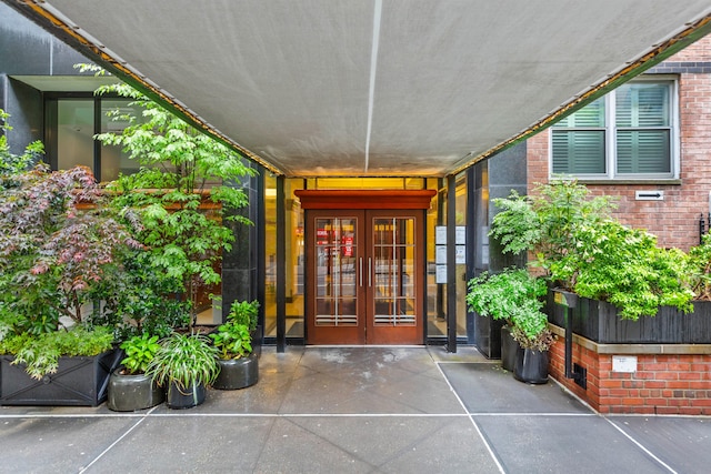 10 W 15th St Unit 927, New York City, NY 10011 - doorway to property with french doors and brick siding