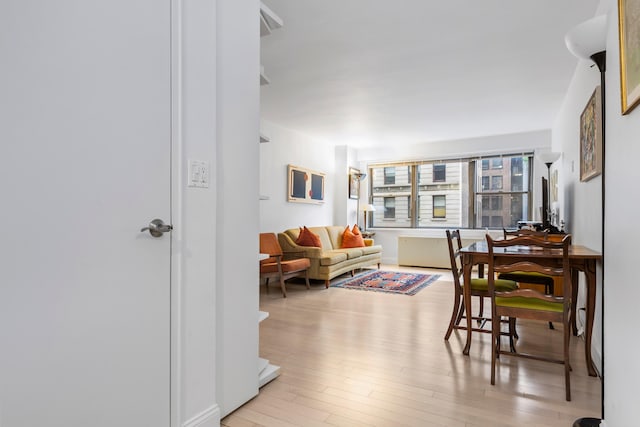 10 W 15th St Unit 927, New York City, NY 10011 - living room with light wood-style flooring
