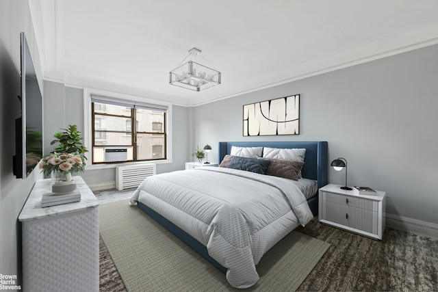 bedroom featuring a chandelier, baseboards, and ornamental molding