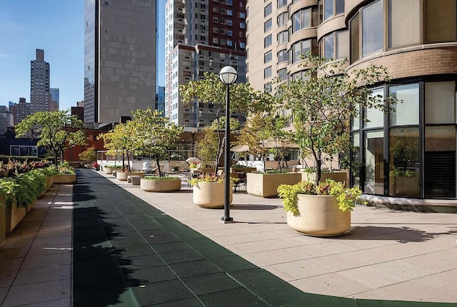 surrounding community featuring a view of city