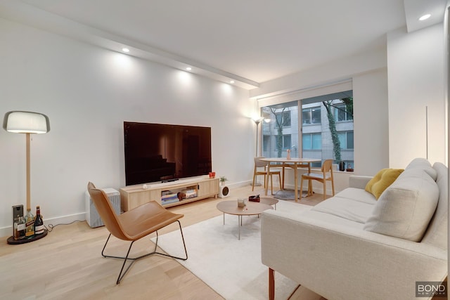 200 E 69th St Unit 2U, New York City, NY 10021 - living area featuring wood finished floors, recessed lighting, and baseboards
