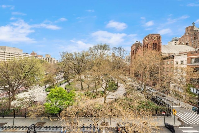 243 E 17th St, New York City, NY 10003 - view of home's community with fence and a view of city