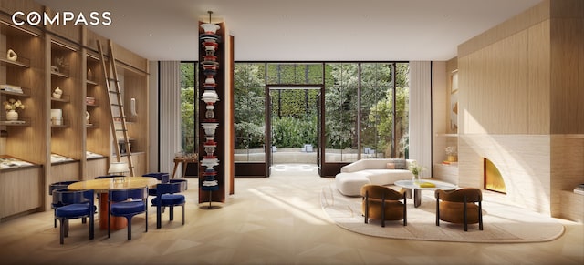 lobby featuring floor to ceiling windows and wood walls