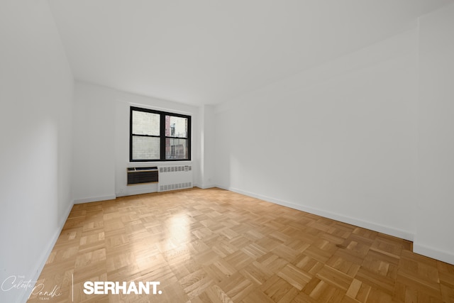 301 E 63rd St Unit 3B, New York City, NY 10065 - spare room featuring radiator and baseboards