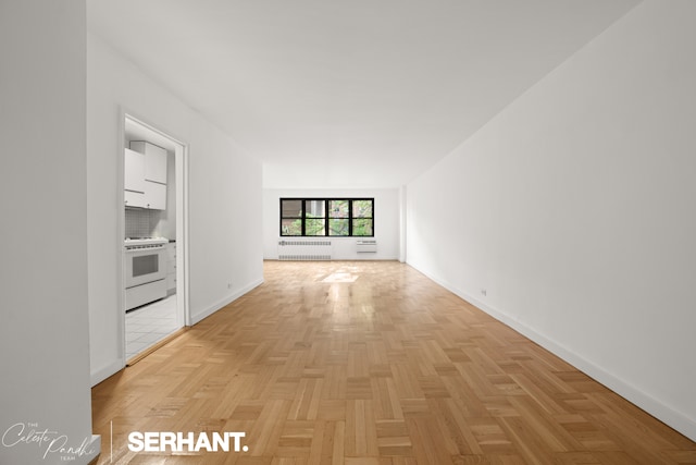 301 E 63rd St Unit 3B, New York City, NY 10065 - unfurnished room featuring radiator heating unit and baseboards