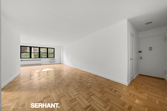 301 E 63rd St Unit 3B, New York City, NY 10065 - unfurnished room featuring radiator and baseboards