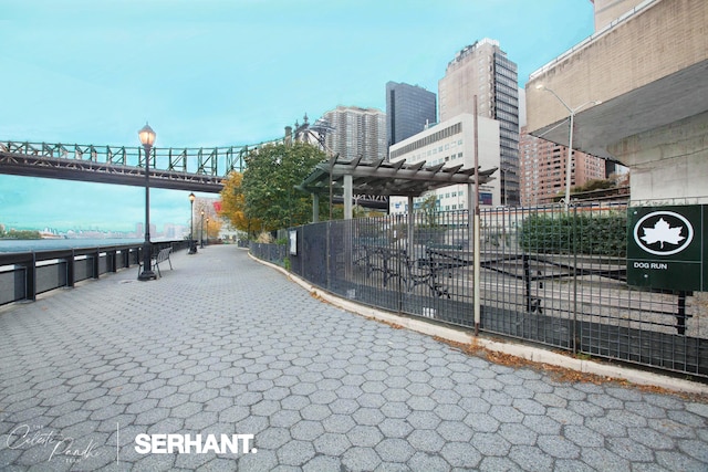 301 E 63rd St Unit 3C, New York City, NY 10065 - view of home's community featuring a pergola and a city view