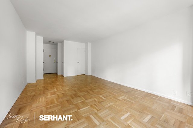 301 E 63rd St Unit 3C, New York City, NY 10065 - spare room with baseboards