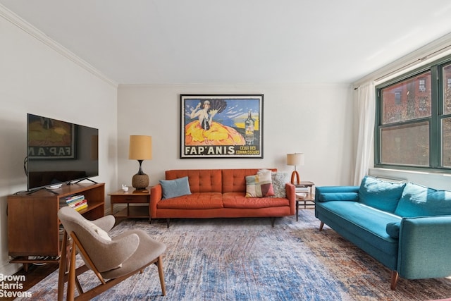 living room with ornamental molding, wood finished floors, and baseboards