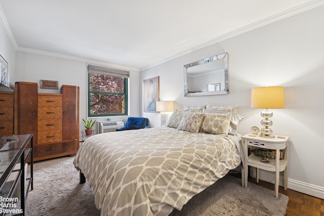 bedroom featuring crown molding and baseboards