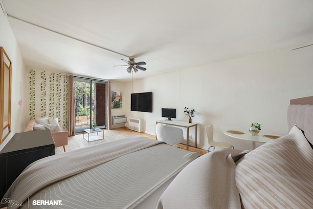 430 E 77th St Unit 4B, New York City, NY 10075 - bedroom with baseboards and a ceiling fan