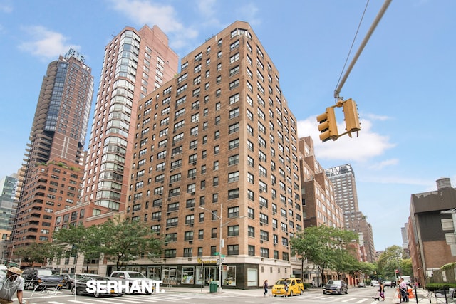 view of building exterior featuring a city view