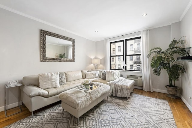 330 E 70th St Unit 2-H, New York City, NY 10021 - living area with crown molding, wood finished floors, baseboards, and recessed lighting