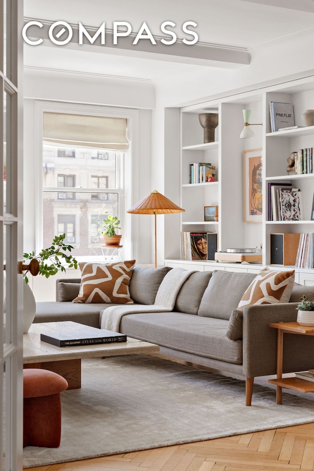 250 W 94th St Unit 11A, New York City, NY 10025 - living area featuring built in shelves and wood finished floors