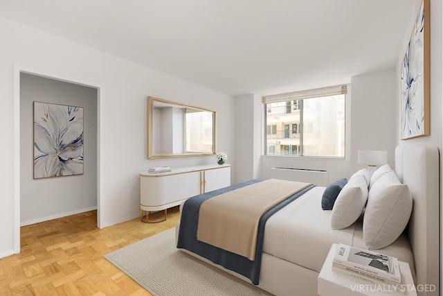 bedroom with baseboards
