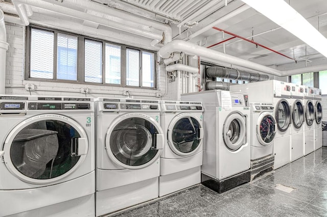 220 E 73rd St Unit 1-A, New York City, NY 10021 - shared laundry with washer and dryer and granite floors
