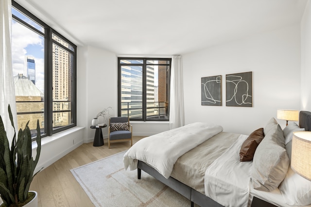 75 Wall St Unit Phl3, New York City, NY 10005 - bedroom with multiple windows and light wood finished floors