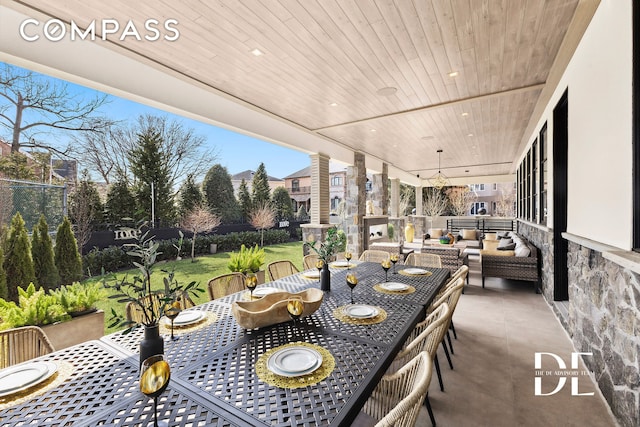 52 Nicolosi Loop, New York City, NY 10312 - view of patio featuring outdoor dining space and an outdoor hangout area