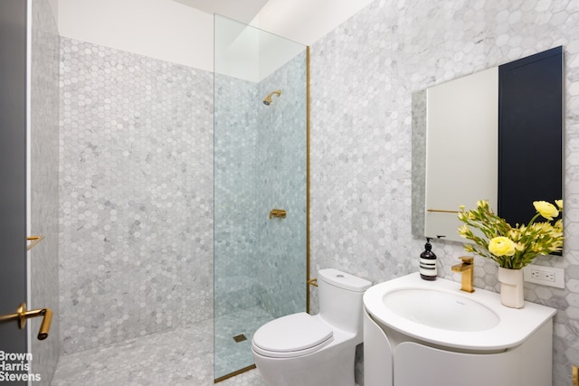 full bath featuring walk in shower, toilet, and vanity