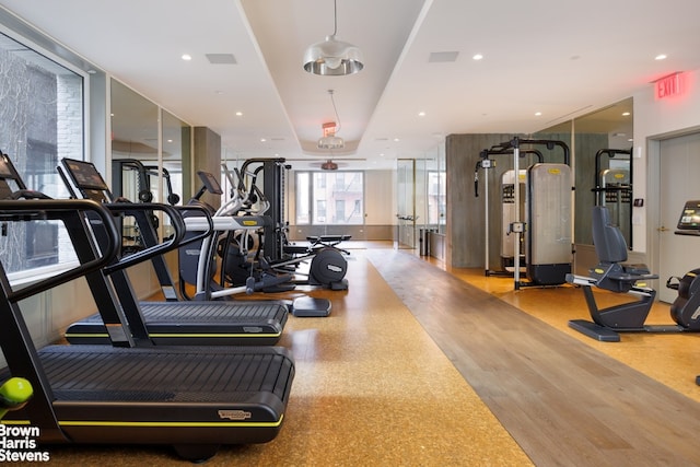 exercise room with ceiling fan and recessed lighting