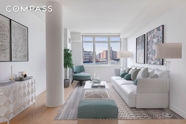 2300 Frederick Douglass Blvd Unit 8D, New York City, NY 10027 - living area featuring wood finished floors and a view of city