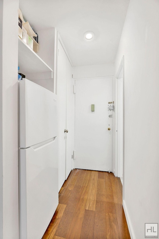 hall featuring light wood-style floors