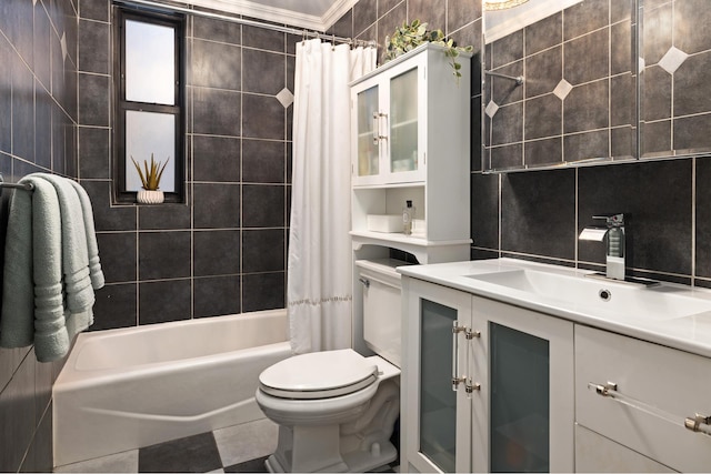 bathroom with toilet, shower / bath combination with curtain, vanity, and tile patterned flooring