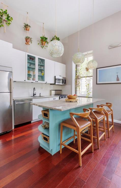 88 Meserole Ave Unit 1B, New York City, NY 11222 - kitchen with stainless steel appliances, a sink, white cabinets, a towering ceiling, and dark wood-type flooring