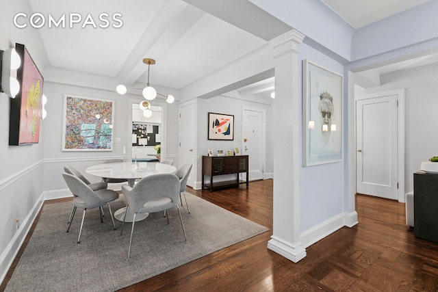 dining space featuring baseboards and dark wood-type flooring