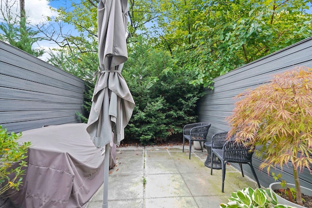view of patio / terrace with fence