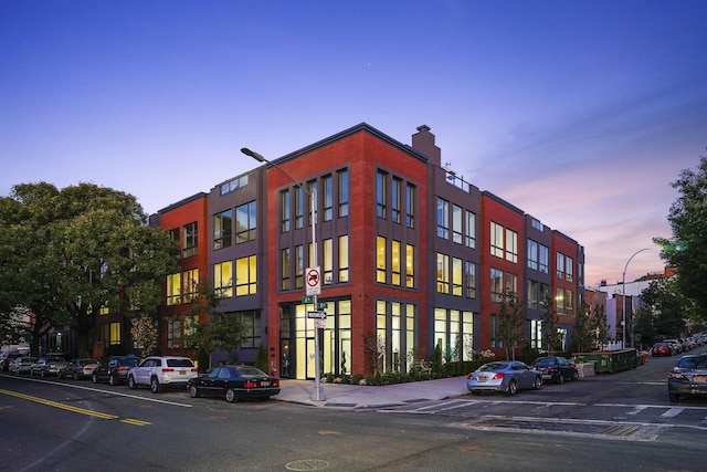 view of property at dusk