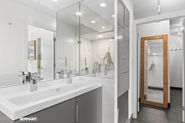 270 W 17th St Unit 12Bc, New York City, NY 10011 - bathroom featuring vanity, recessed lighting, and tile patterned floors