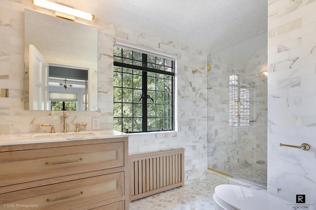 4500 Fieldston Rd, New York City, NY 10471 - full bathroom featuring radiator heating unit, a marble finish shower, vanity, toilet, and tile walls