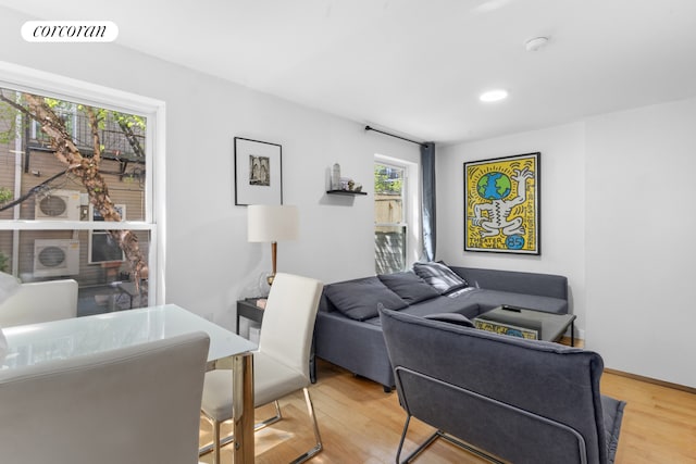 251 Powers St, New York City, NY 11211 - living room with wood finished floors