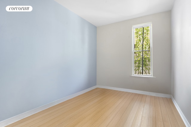 251 Powers St, New York City, NY 11211 - unfurnished room with hardwood / wood-style flooring and baseboards