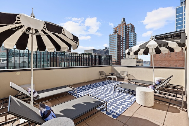 view of patio / terrace with a view of city