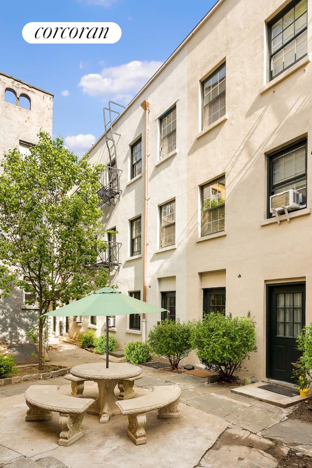 view of apartment building / complex with cooling unit