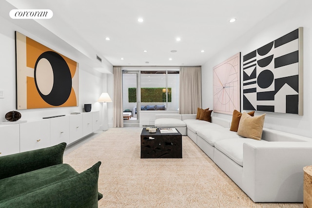 living area featuring recessed lighting