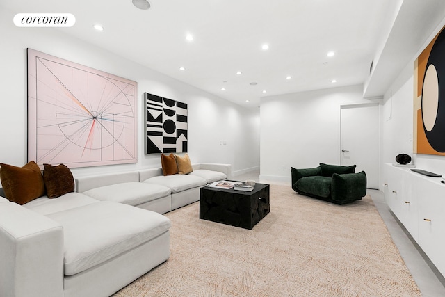 living room featuring recessed lighting and light colored carpet