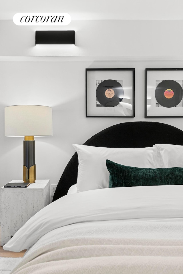 bedroom featuring wood finished floors