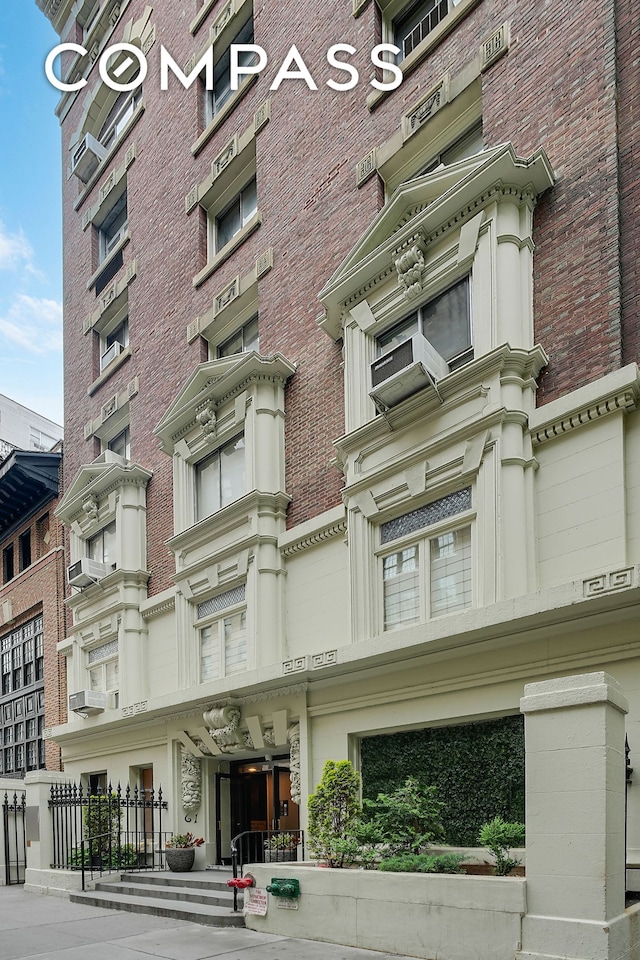 61 E 77th St Unit 5F, New York City, NY 10075 - view of building exterior featuring cooling unit