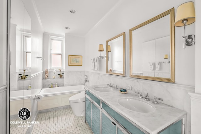 215 E 72nd St Unit 12E, New York City, NY 10021 - bathroom with a bath, crown molding, a wainscoted wall, tile patterned floors, and double vanity
