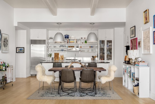 70 Washington St Unit 9A, New York City, NY 11201 - dining room with beam ceiling and light wood-style flooring