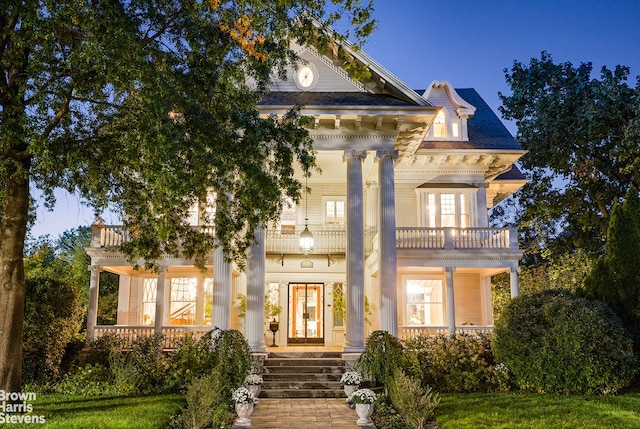 1305 Albemarle Rd, New York City, NY 11226 - greek revival inspired property with a balcony, a porch, and french doors