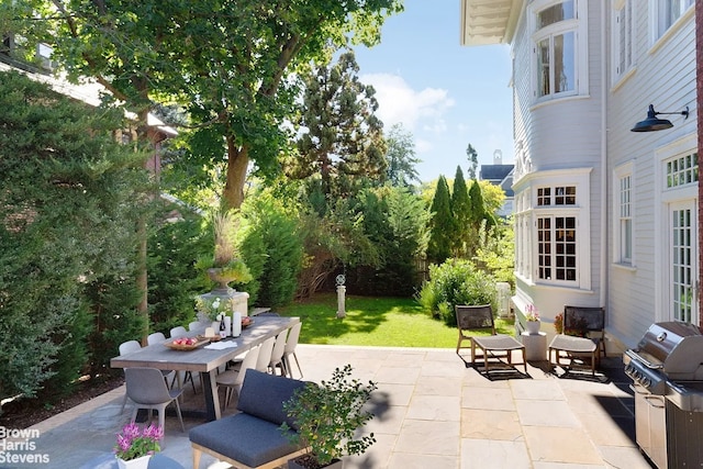1305 Albemarle Rd, New York City, NY 11226 - view of patio featuring outdoor dining area and area for grilling