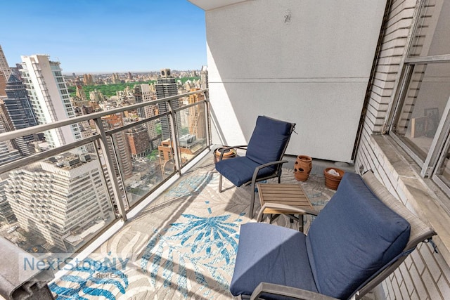 balcony featuring a city view