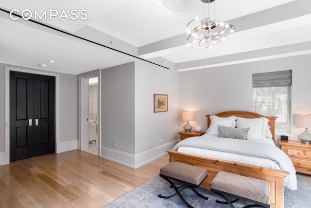 182 W 82nd St Unit 4E, New York City, NY 10024 - bedroom with light wood finished floors and baseboards