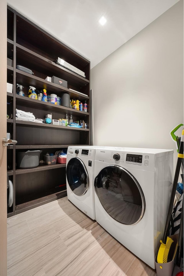 49 Chambers St Phb, Phb, New York City, NY 10007 - washroom featuring washing machine and dryer and wood finished floors