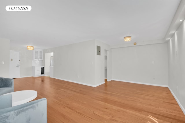205 3rd Ave Unit 2V, New York City, NY 10003 - living area featuring light wood finished floors, baseboards, and a fireplace